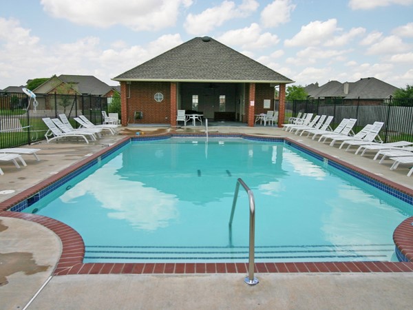 Pool and clubhouse located in Carrington Place 