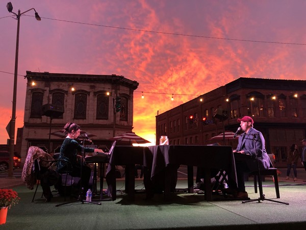 Under a gorgeous Monroe sunset, dueling pianos entertained hundreds of music lovers
