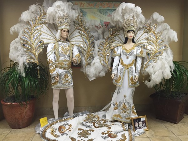Lake Charles Visitors Center showcasing Mardi Gras King and Queen costumes
