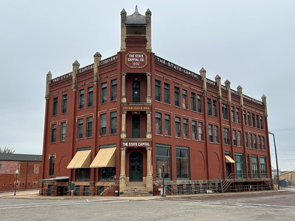 The State Capital Newspaper Building. It is listed on the National Register of Historical Places