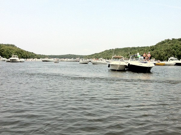 Hundreds of boats owners in Party Cove relaxing.