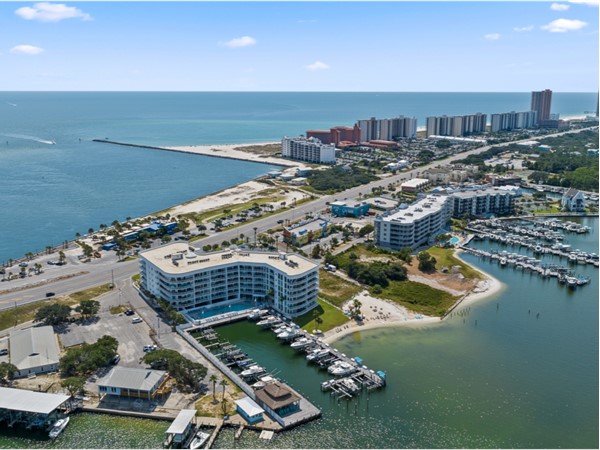 Drone shot from the skies above the beautiful Pass Condominium. 