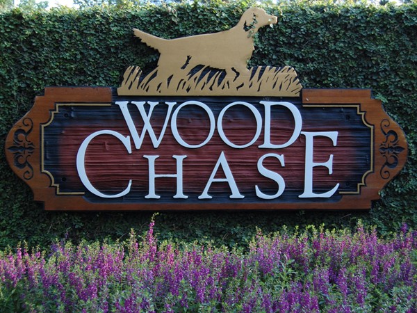 The entry to Woodchase - conveniently located off Perkins Road between College Drive and Essen