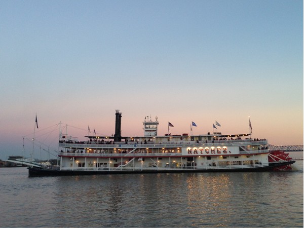 The Natchez paddle boat setting sail at dusk in the French Quarter