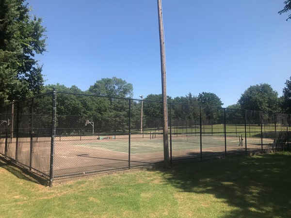 Two lighted tennis courts, one for tennis, other opened up for soccer practice or Corn Hole