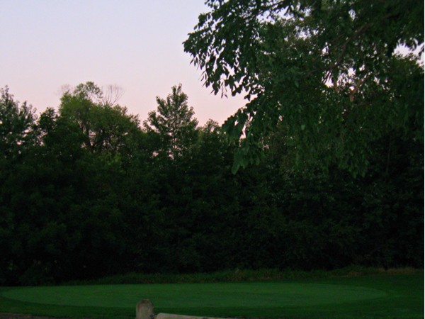 Warren Swigart Golf Course practice green in Maple Village Subdivision 