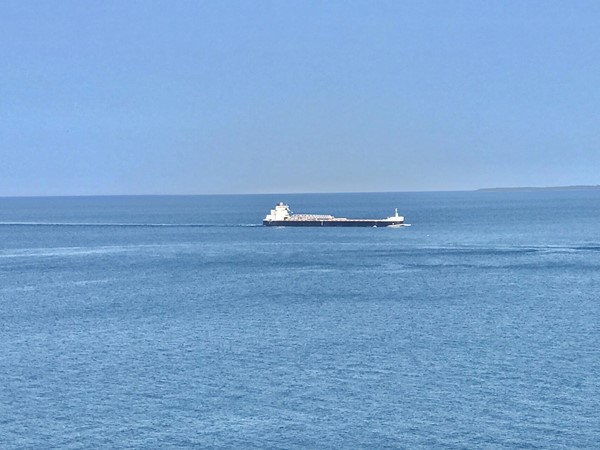 Freighter travels between Mackinac Island and Bois Blanc Island