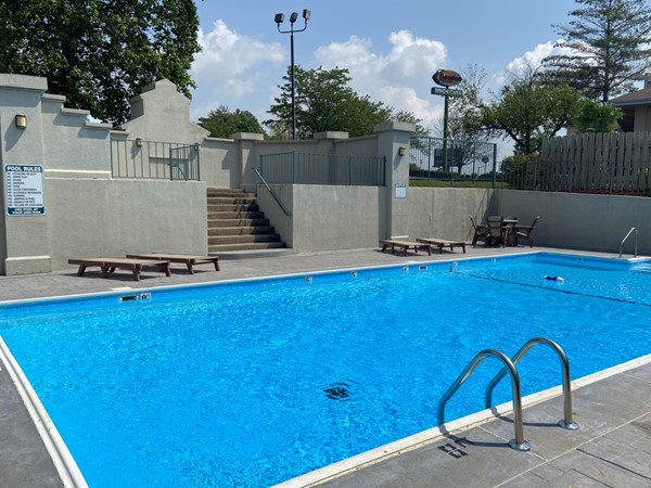 Enjoy the pool at The Greens condominiums