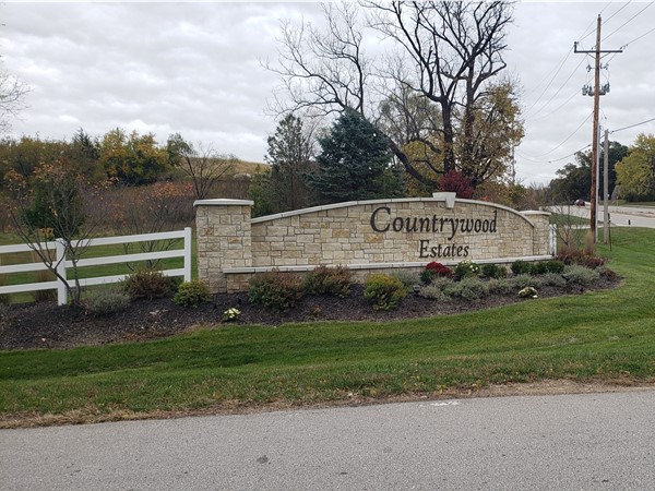 Entrance sign at one of Platte County's hidden treasures! Beautiful custom homes on estate lots