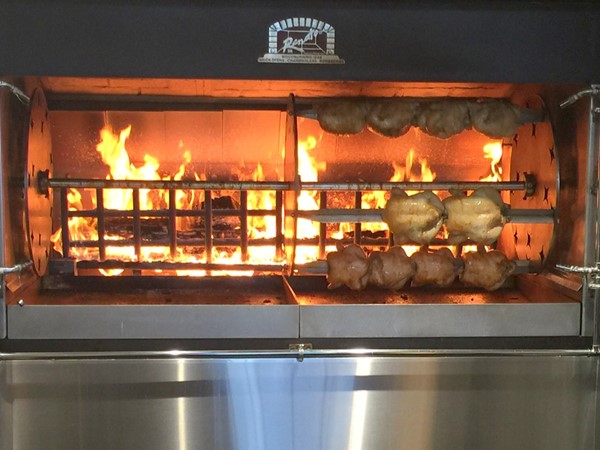 Fresh rotisserie chicken is almost ready! The Uptown Grocery is located at 9515 N May Avenue