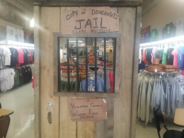 Cops and Doughnuts Gift shop has its own jail cell for you 