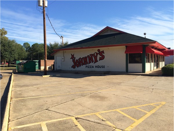Hidden in Broadmoor, Johnny's Pizza is a popular place for pizza. Eat there or pick up