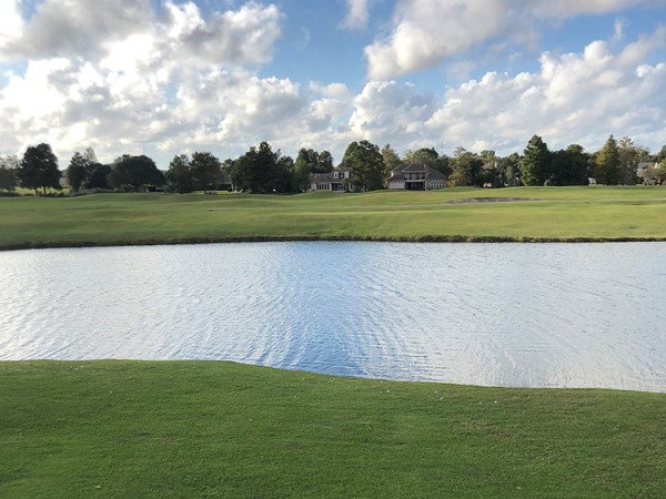 Views of the golf course from a condo unit in English Turn
