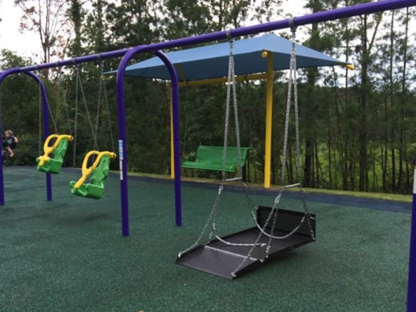 Wheelchair swings and adaptive swings at Miracle League Park