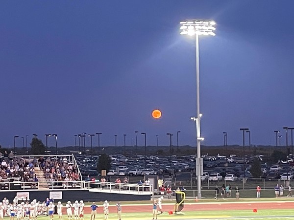 Friday night lights with this perfectly glowing full moon!! Go Liberty and Liberty North