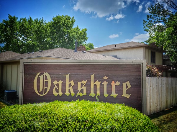 Entrance sign to Oakshire Townhome Subdivision near Oak Park Mall