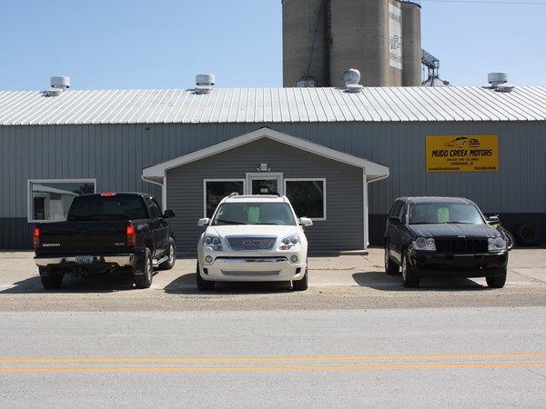 Mudd Creek Motors. They sell used cars, tires and are a full service garage 