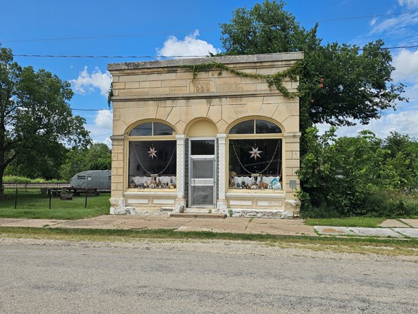Old bones of an 1898 bank, now full of character and collectibles behind glass.