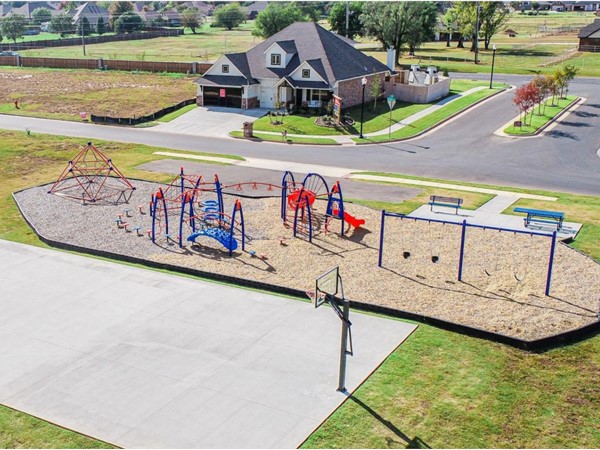 Scissortail Springs park and basketball court! Located across from the Taber Model Home 