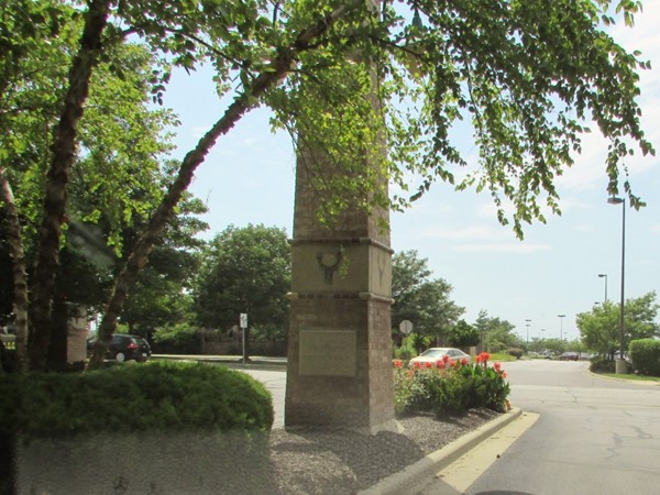 The secondary entrance to the subdivision is immediately adjacent to Deer Creek Marketplace
