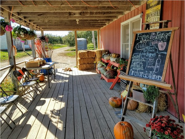 Relax and enjoy fresh apple cider at Pome on the Range Orchards & Winery
