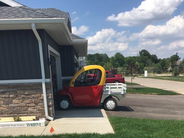 This golfer quite possibly never wanted to grow up. Little Tikes golf cart spotted