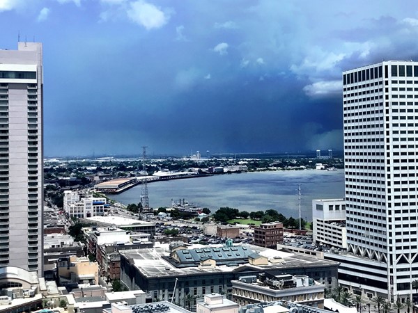 The high-rise buildings in the CBD are the best places to watch afternoon summer rainstorms