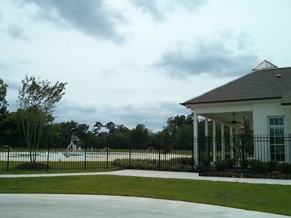 Pool and clubhouse at Long Farm Village