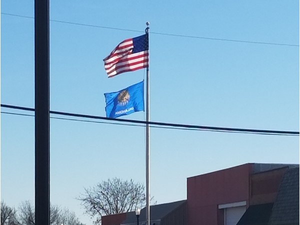 Flag pole at the traffic circle in Downtown Bixby