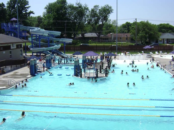 Memorial Pool is a popular summer spot for local residents with water slides & children's play pool