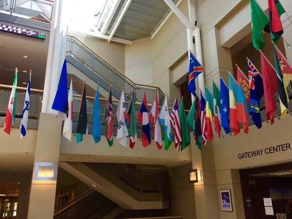 UCM Admin Bldg: flags for students around the world who have attended this outstanding university