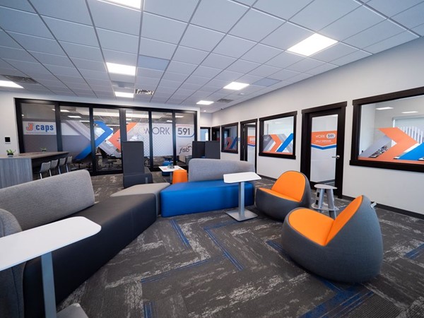 Jesup orange and blue pride shows through in the decor and finishes in CoWork 591