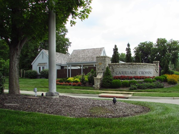 Entrance and clubhouse with pool on Nall Avenue