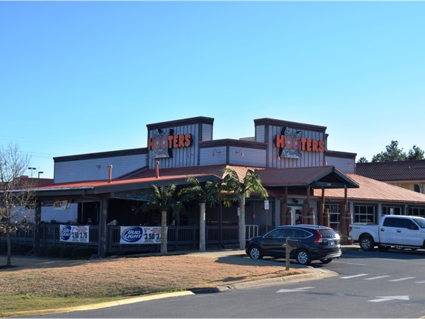 Hooters is a local favorite wings and beer joint. It sits prominently facing Hwy 67 and McCain