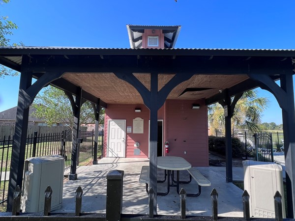Pavilion at Country Lakes subdivision with bathrooms and picnic tables