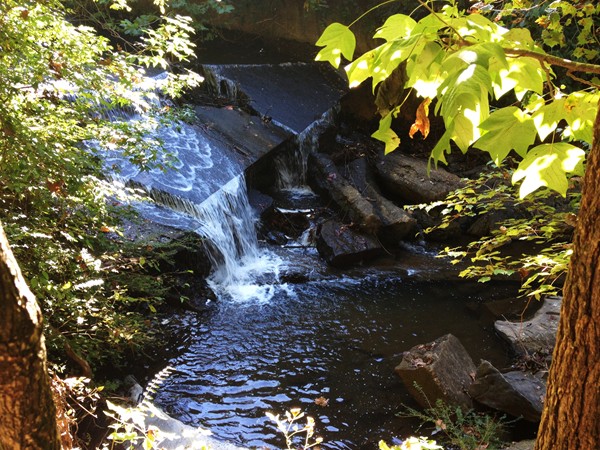 An old man-made waterfall at Cosby Lake beyond the southeast corner bridge