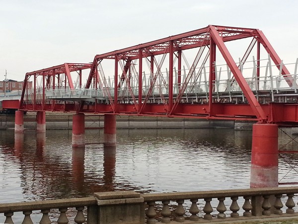 Red train bridge by Principal Park