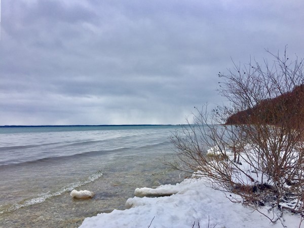 Looking south at East Grand Traverse Bay from Old Mission Point Park trails. Love winter hikes