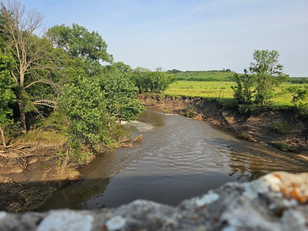 The Cottonwood River winds peacefully through Kansas prairie—views like this never get old