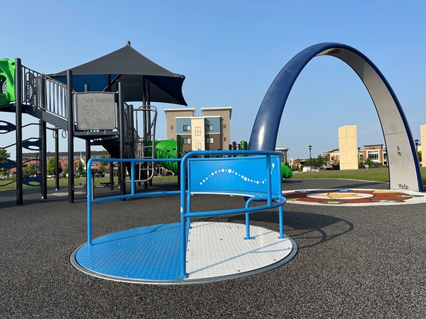 Check out the Discovery Arch and other inclusive play structures at The District Playground