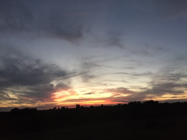 Sunset on the Flint Hills. Traveling west from Tuttle Creek at twilight; we have beautiful sunsets