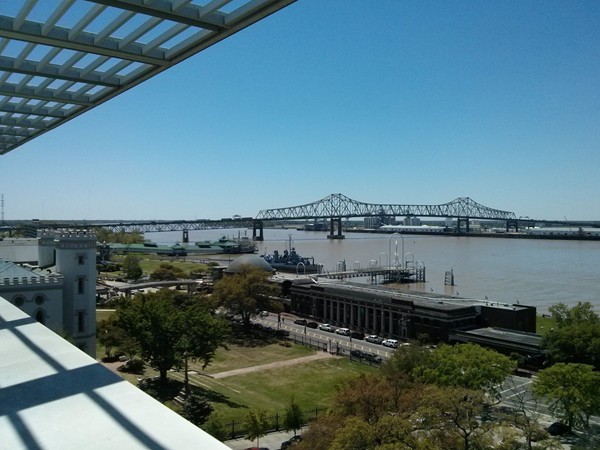 Views of the river and Louisiana Art and Science Museum from the terrace of Tsunami 