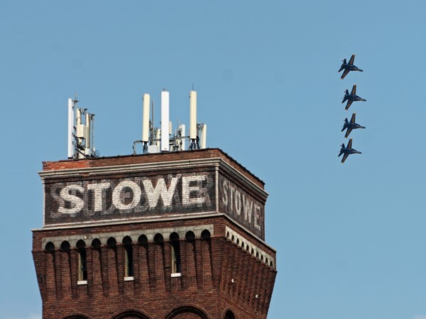 Navy Blue Angels perform above the historic Stowe Hardware & Supply Company Building