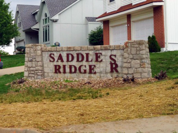 Located near 79th & Pflumm, Saddle Ridge is a well-established neighborhood with cute landscaping.