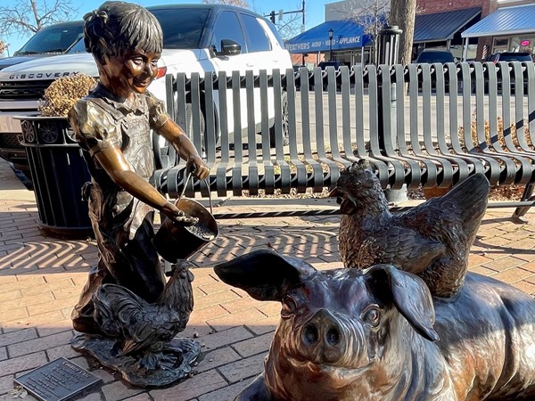 Downtown Edmond has bronze statues for visitors to enjoy as they walk through town
