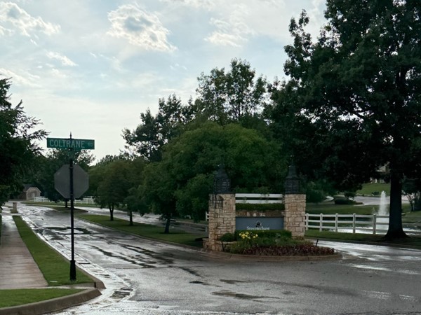 Rain-kissed streets and classic charm — welcome to Steeplechase in Edmond