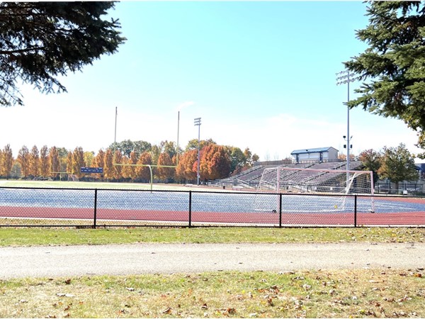 Bleacher view of the football field and outdoor track at Wayne Memorial High School