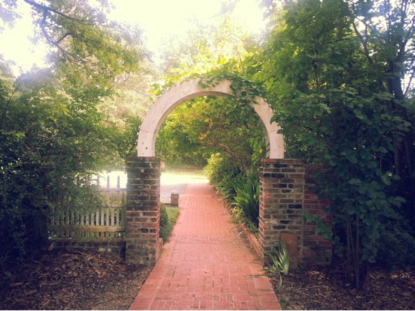 An arched entrance on the grounds of Grace Episcopal Church. A historic landmark in Pike Road