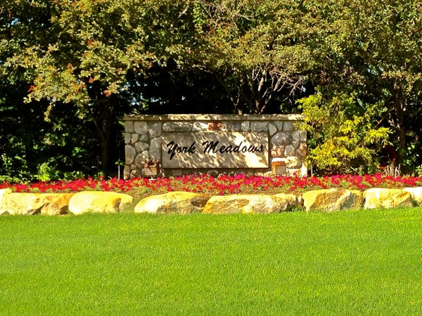 A colorful entrance to the beautiful York Meadows community
