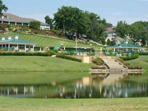 Beautiful Club House and pool area overlooking water feature at Osage National Golf Course